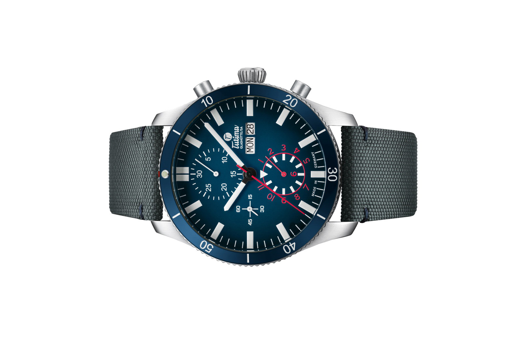 Đồng hồ đeo tay thương hiệu Tutima, dòng sản phẩm Grand Flieger Airport, Ref no: 6407-01, mặt số xanh dương Dégradé, size 41mm, máy tự động, vỏ đồng hồ bằng thép không gỉ và dây đeo vải Cordura®, hàng mới 100%