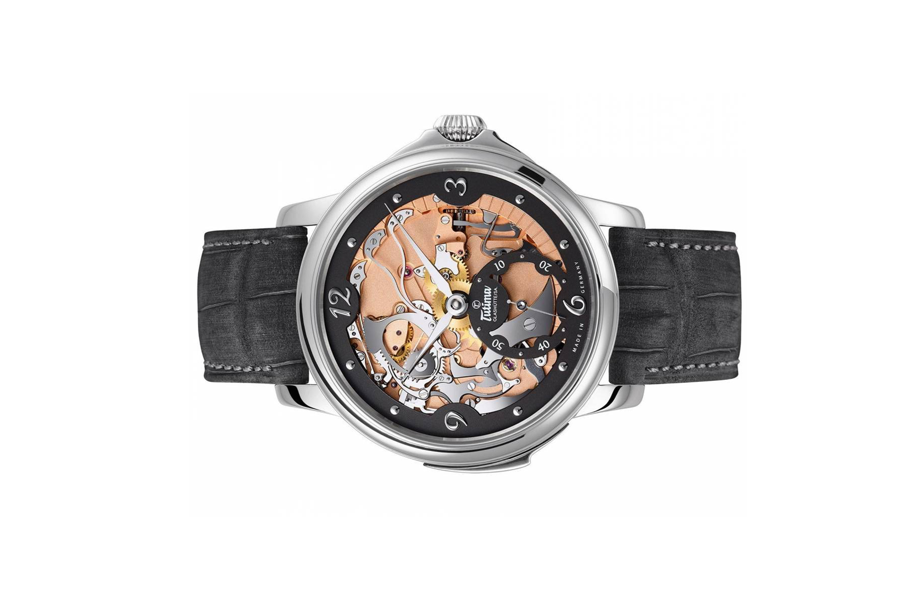 Đồng hồ đeo tay thương hiệu Tutima, dòng sản phẩm Hommage, Ref no: 6800-01, mặt số vàng hồng 18k, Ruthenium và Skeleton, size 43mm, máy lên cót tay, vỏ và khóa đồng hồ bằng platinum, dây đeo da cá sấu, hàng mới 100%