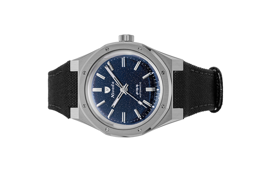 Đồng hồ đeo tay thương hiệu Nivada Grenchen, dòng sản phẩm F77, Ref number: 68018A77, mặt số xanh đậm Aventurine, size 37mm, máy tự động, vỏ bằng titanium và dây vải Velcro, mới 100%