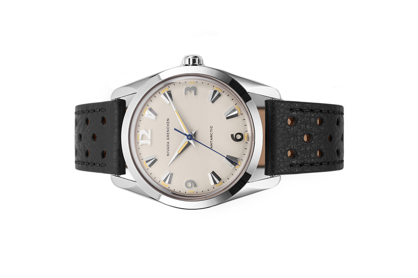 Đồng hồ đeo tay thương hiệu Nivada Grenchen, dòng sản phẩm Antarctic, Ref number: 35004M16, mặt số màu trắng size 35mm, máy lên cót tay, vỏ bằng thép không gỉ 316, dây da bò màu nâu, mới 100%