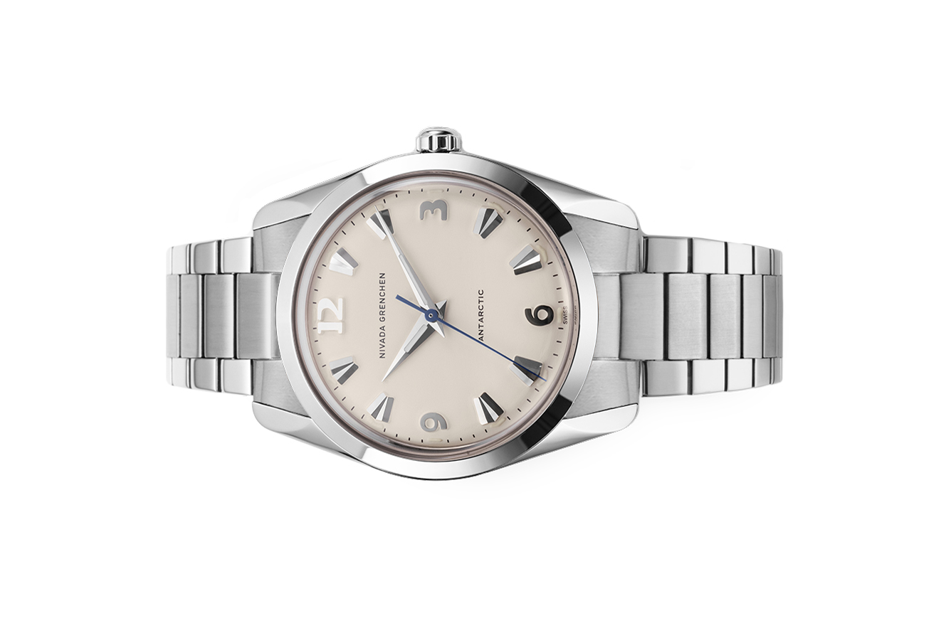 Đồng hồ đeo tay thương hiệu Nivada Grenchen, dòng sản phẩm Antarctic, Ref number: 35004M20, mặt số màu trắng size 35mm, máy lên cót tay, vỏ và dây bằng thép không gỉ 316, mới 100%