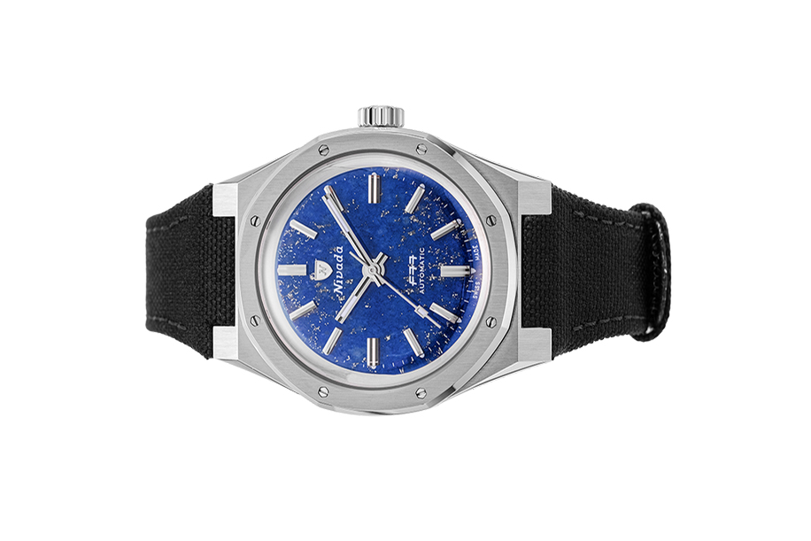 Đồng hồ đeo tay thương hiệu Nivada Grenchen, dòng sản phẩm F77, Ref number: 68009A77, mặt số đá Lapis Lazuli xanh dương nhạt size 37mm,máy tự động, vỏ kim loại thép không gỉ 316L và dây vải Velcro,mới 100%