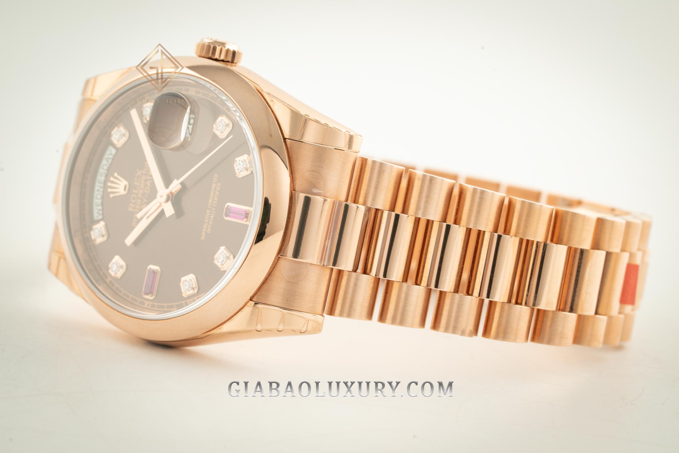 Đồng Hồ Rolex Day-Date 36 118205 Mặt Số Chocolate Nạm Đá Ruby Đỏ