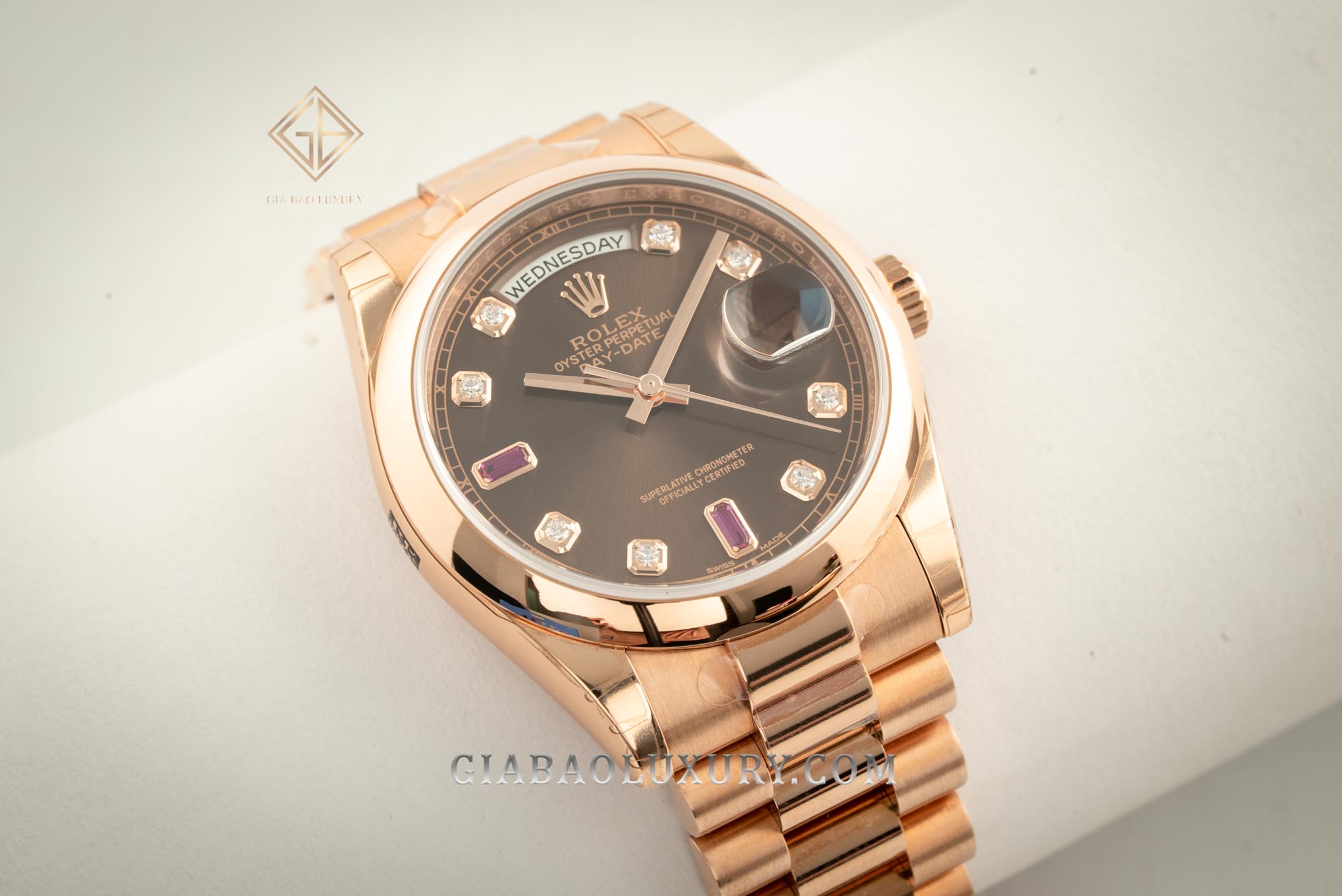 Đồng Hồ Rolex Day-Date 36 118205 Mặt Số Chocolate Nạm Đá Ruby Đỏ