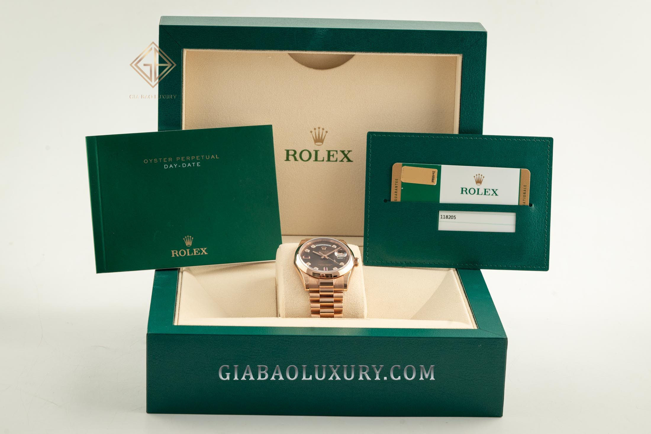 Đồng Hồ Rolex Day-Date 36 118205 Mặt Số Chocolate Nạm Đá Ruby Đỏ