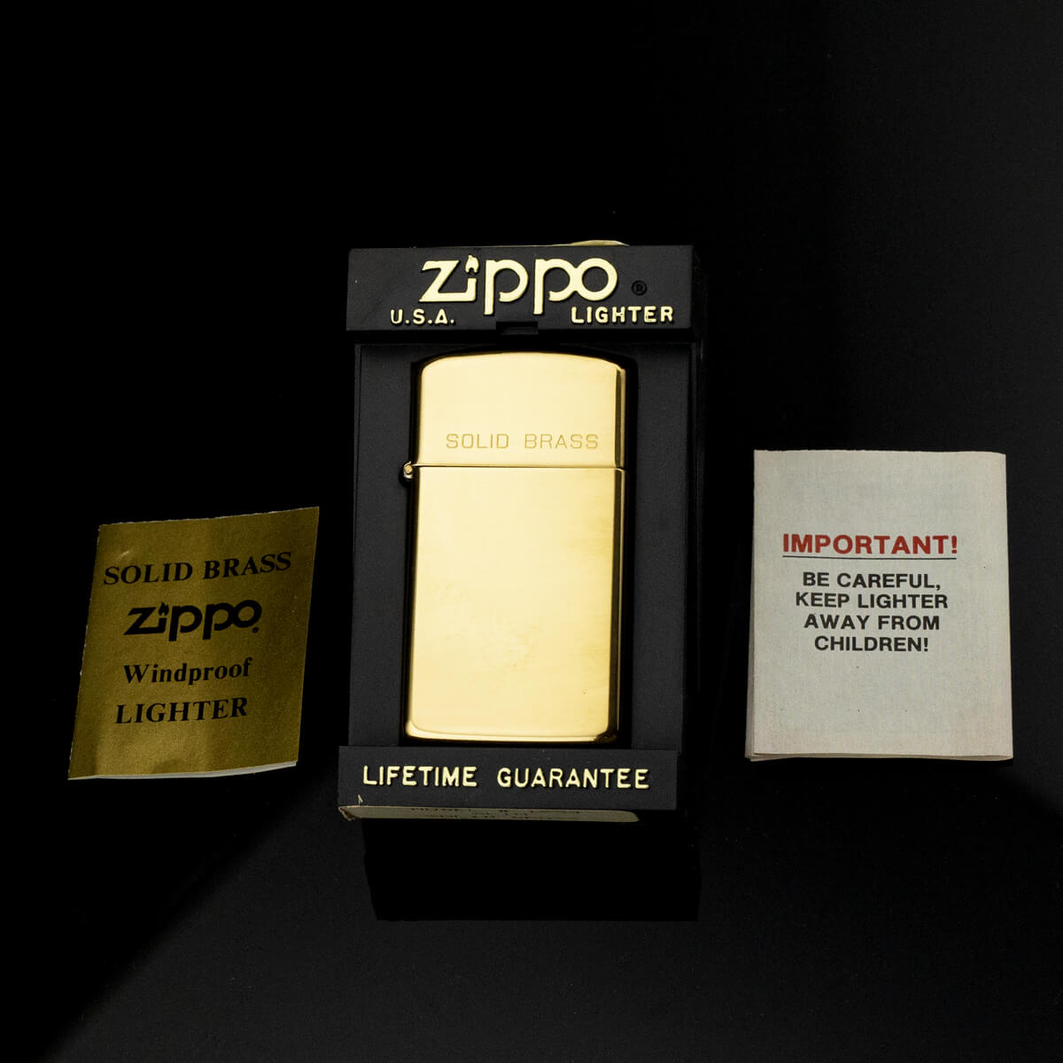 bat-lua-zippo-slim-solid-brass-1932-1991-chu-nien-dong-nguyen-khoi-mau-vang