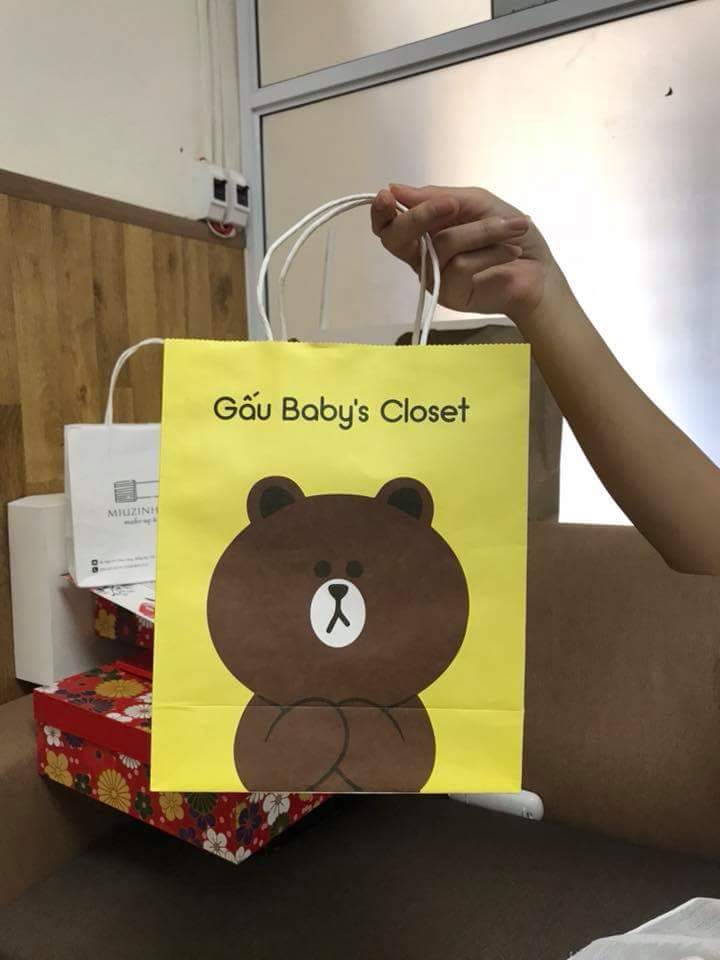 Túi giấy kraft vàng đựng đồ chơi trẻ nhỏ