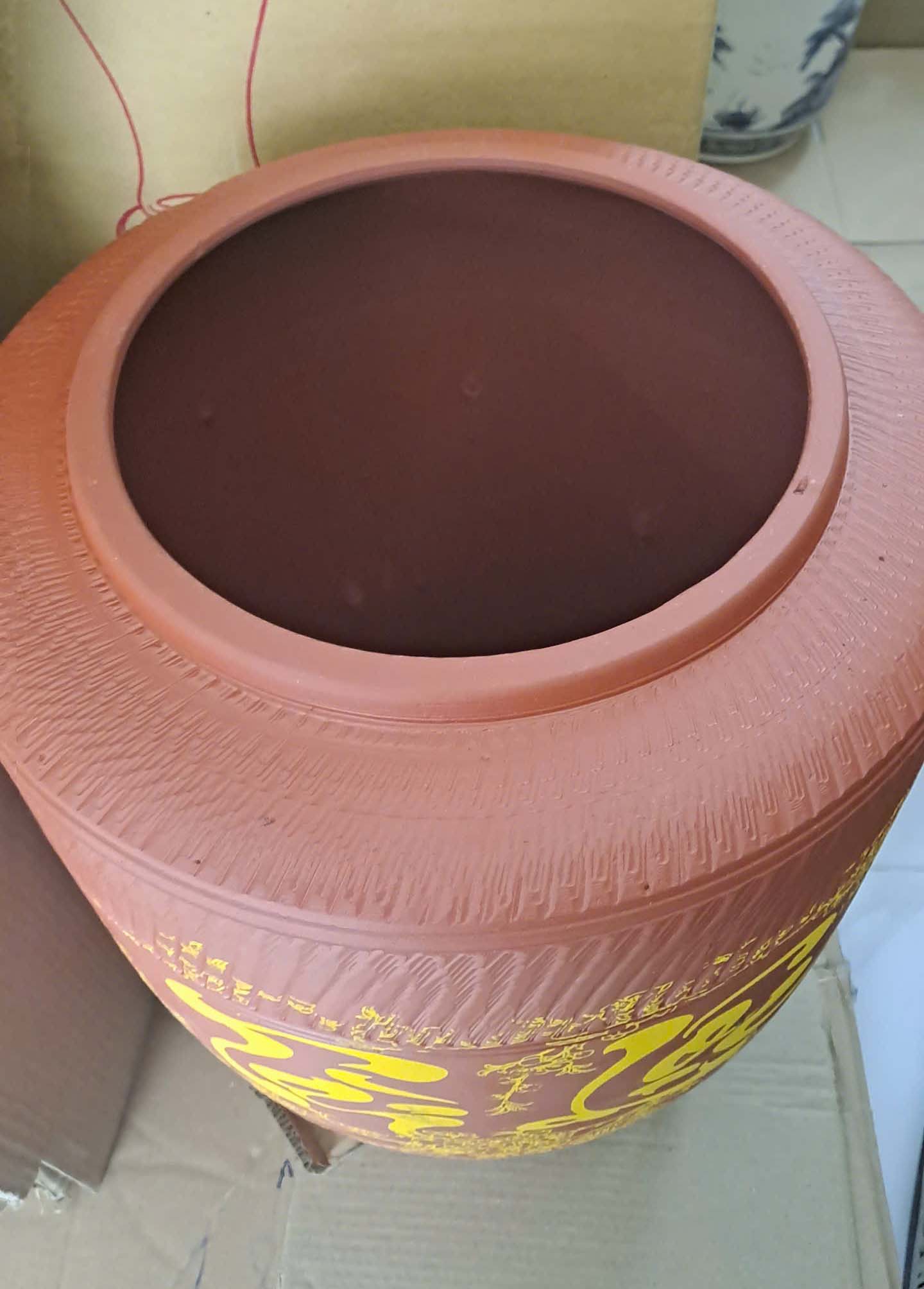 hình ảnh của hũ sành đựng gạo