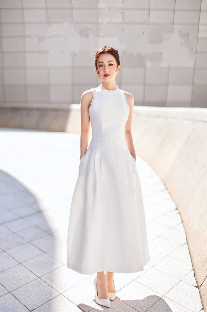 Đầm dự tiệc dáng xòe kiểu sát nách phối túi đính viền ngọc