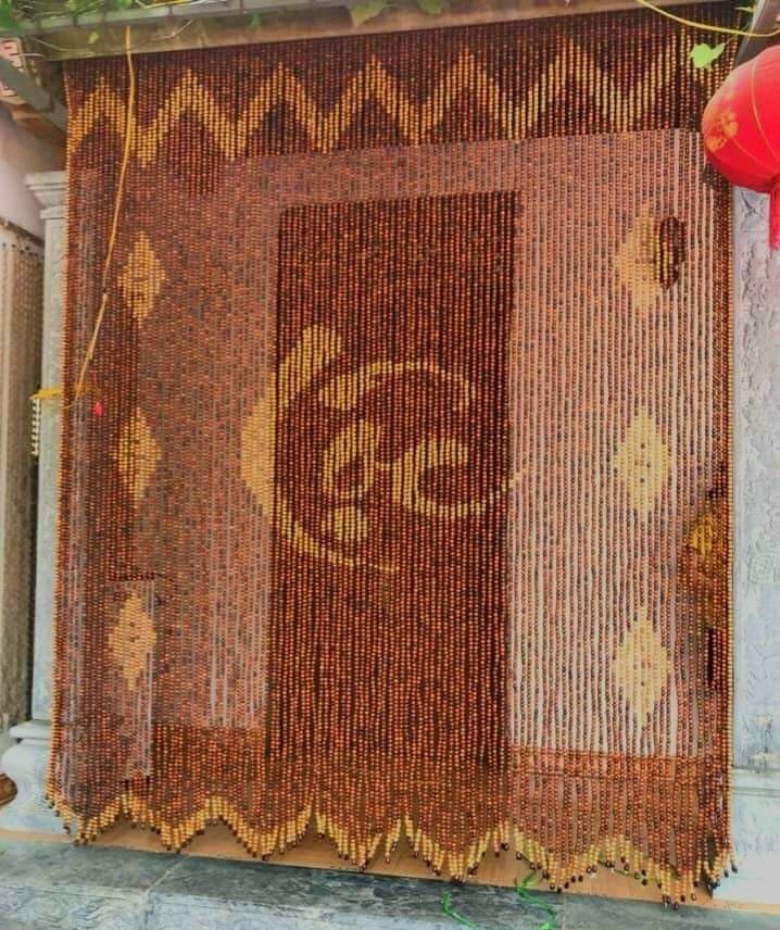 Ý nghĩa của rèm hạt gỗ chữ Lộc trong trang trí nhà hiện đại.
