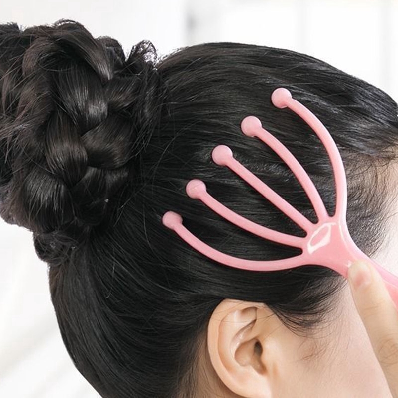 Massage da đầu bằng dụng cụ