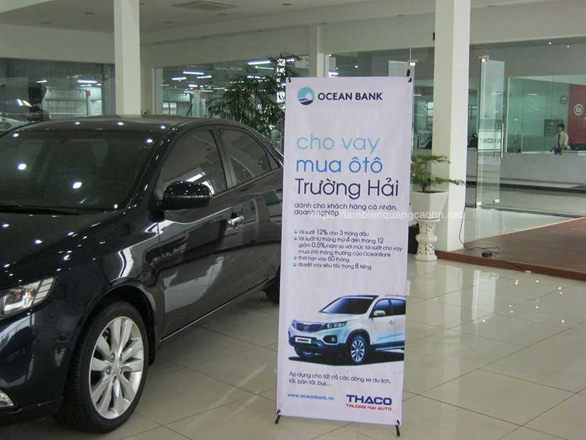 chân standee chữ X, giá chữ X, giá cuốn nhôm, standee hình người, standee die cut