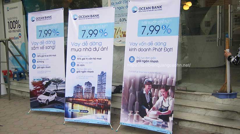 chân standee chữ X, giá chữ X, giá cuốn nhôm, standee hình người, standee die cut