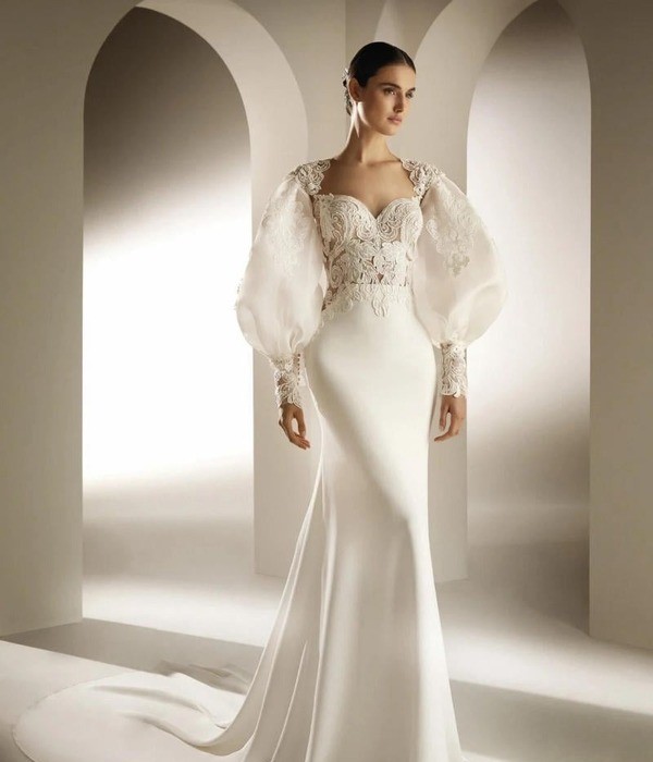 Váy cưới tay bồng điệu đà là biểu tượng của sự nữ tính