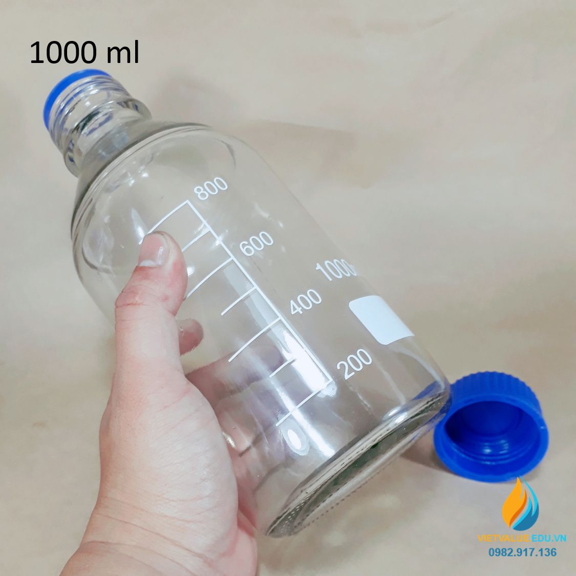 Chai trung tính nắp vặn xanh, vạch chia trong suốt dung tích 1000ml