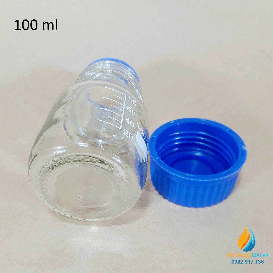 Chai trung tính nắp vặn xanh, vạch chia trong suốt dung tích 100ml