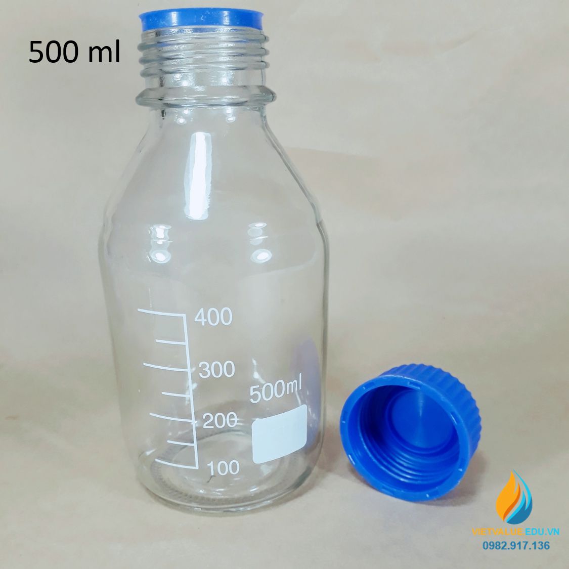 Chai trung tính nắp vặn xanh, vạch chia trong suốt dung tích 500ml
