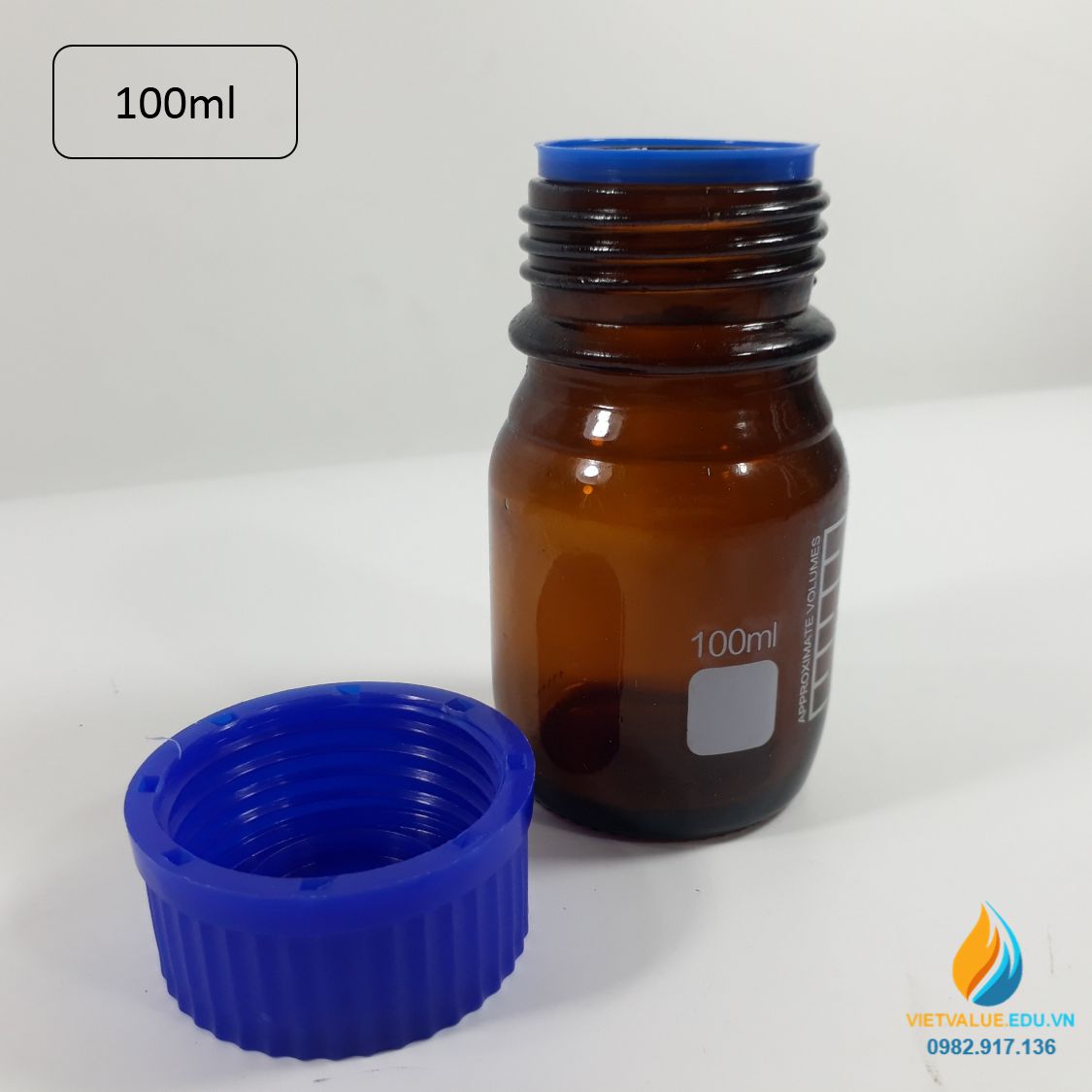 Chai trung tính 100ml màu nâu hổ phách, nắp vặn xanh, chịu nhiệt