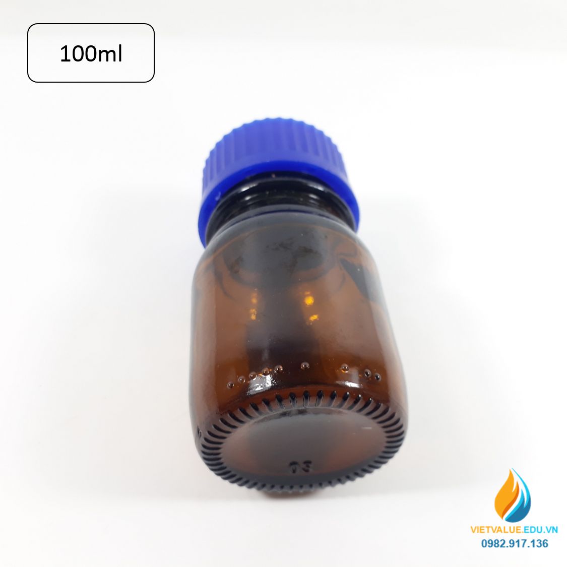 Chai trung tính 100ml màu nâu hổ phách, nắp vặn xanh, chịu nhiệt