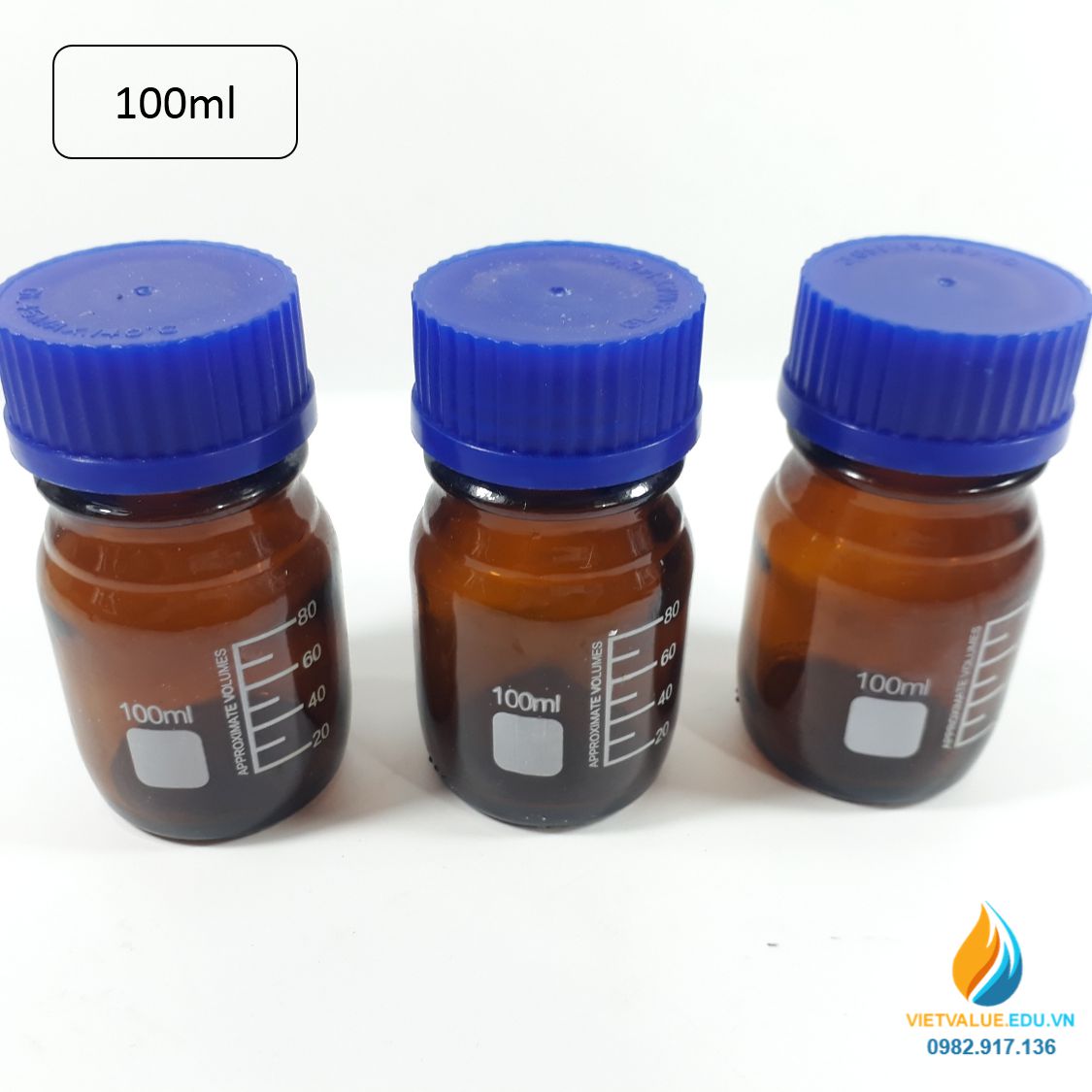 Chai trung tính 100ml màu nâu hổ phách, nắp vặn xanh, chịu nhiệt