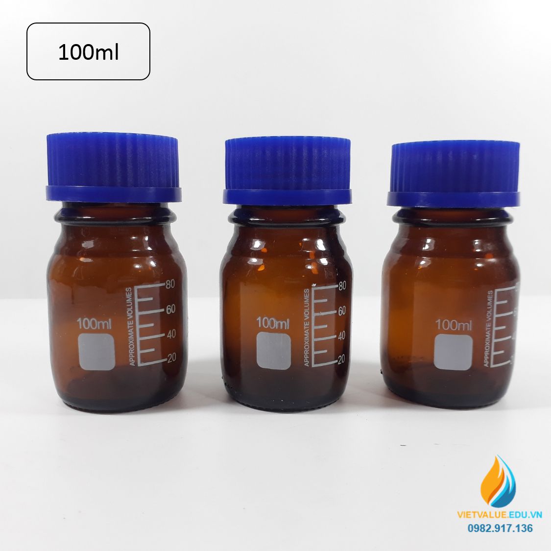 Chai trung tính 100ml màu nâu hổ phách, nắp vặn xanh, chịu nhiệt