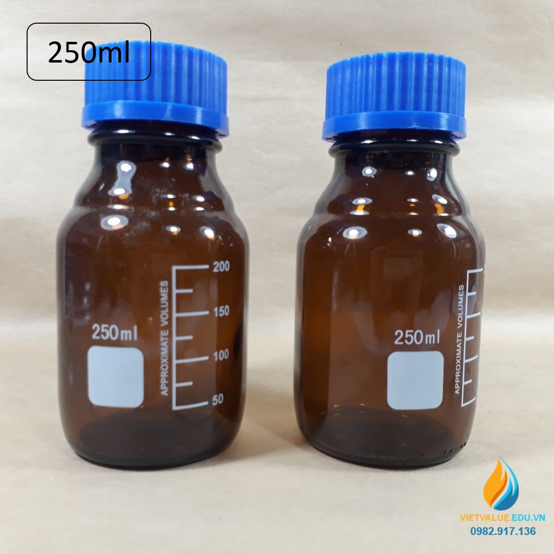 Chai trung tính 250ml màu nâu hổ phách, nắp vặn xanh, chịu nhiệt