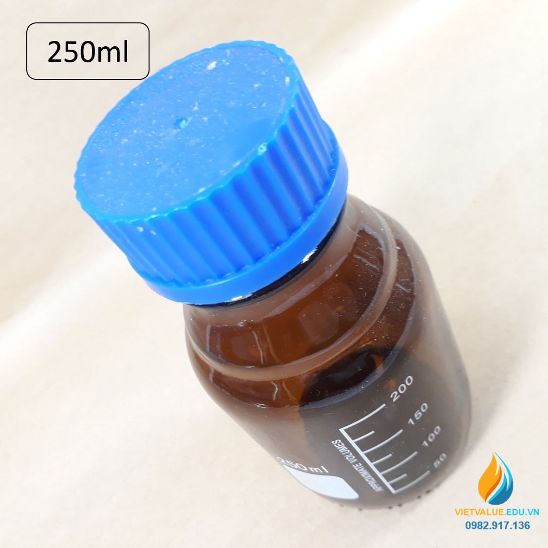 Chai trung tính 250ml màu nâu hổ phách, nắp vặn xanh, chịu nhiệt