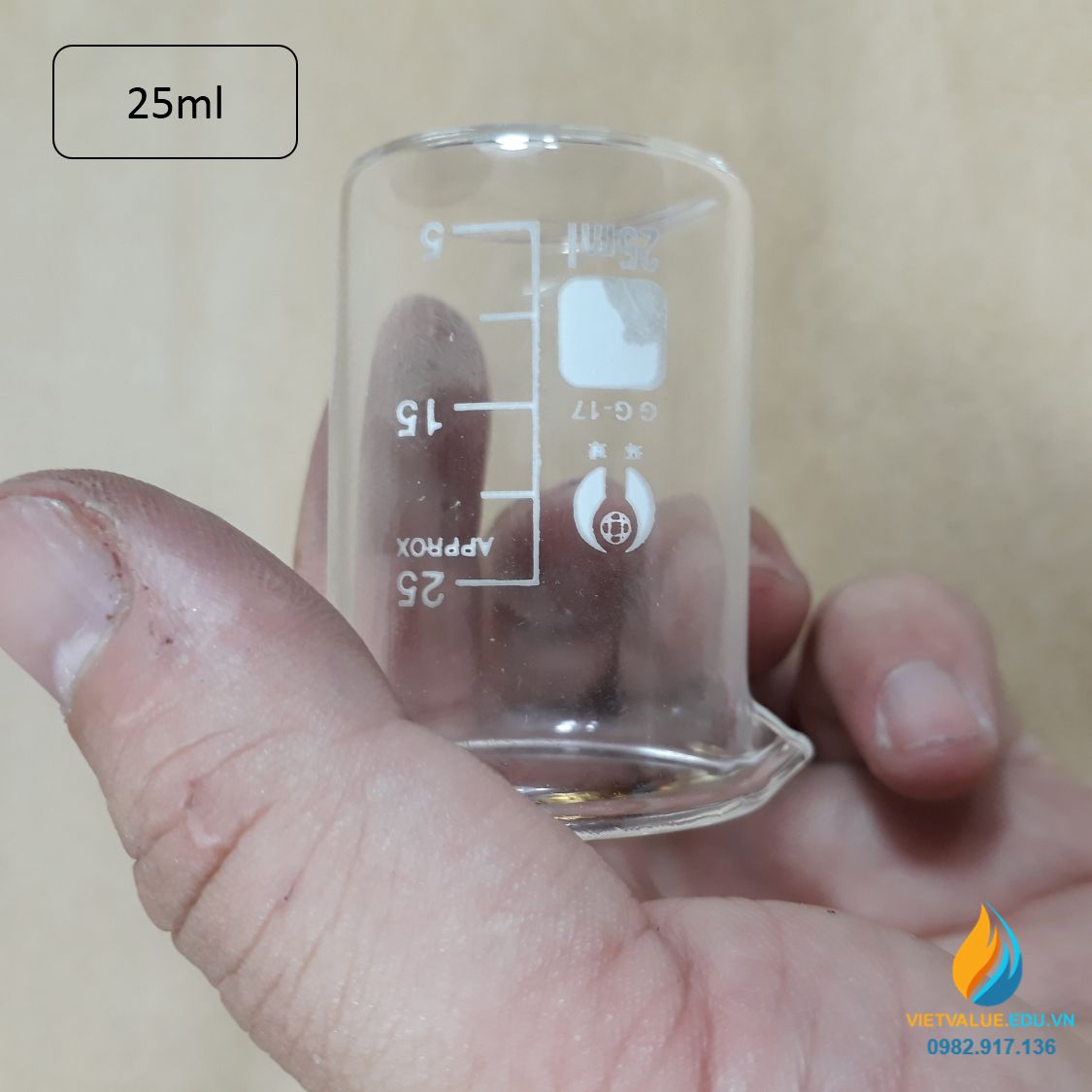 Cốc đong thủy tinh có vạch chia, dung tích 25ml, có mỏ, chịu nhiệt độ cao
