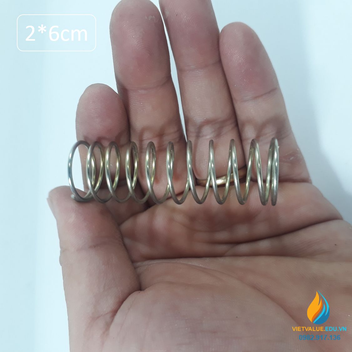 Lò xo thí nghiệm định luật Húc, bằng thép đường kính 2cm, chiều dài tự nhiên 6cm