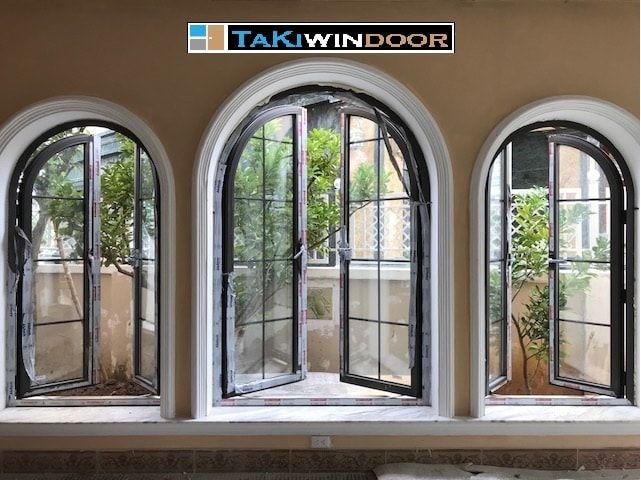 Thi công cửa sổ nhôm Xingfa uốn vòm với kính hộp có nan tại Vinhomes