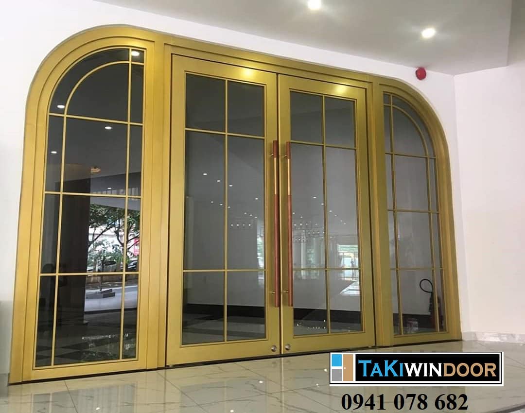 Thi công cửa thủy lực khung inox vàng mờ xước
