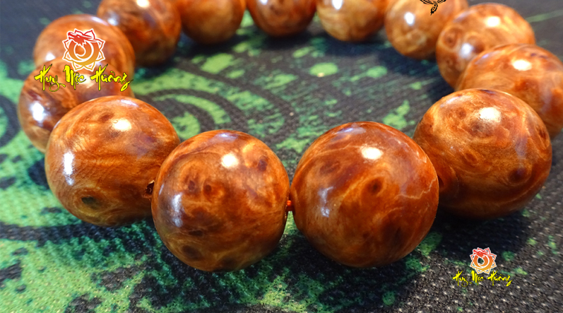 Vòng gỗ nu huyết long giá bao nhiêu?