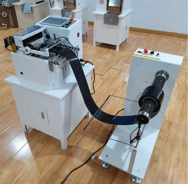 Máy nhả cuộn decal nguyên liệu