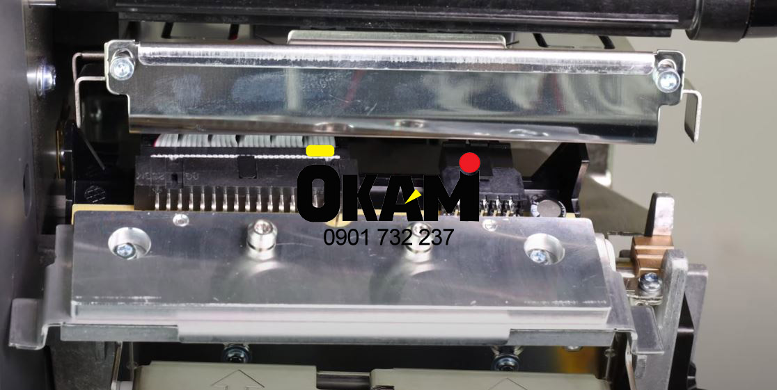 thay dau in may in ma vach zebra zt411