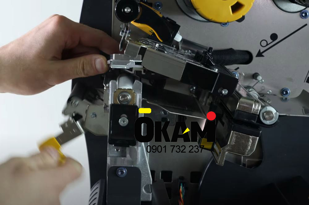 thay dau in zebra zt411