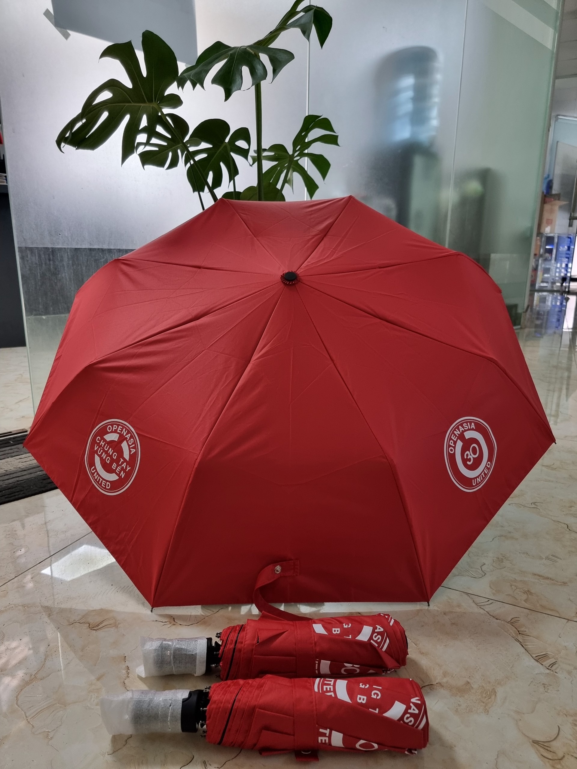 Ô dù cầm tay in logo Open Asia 1 Ô dù cầm tay in logo Open Asia Quà tặng công nghệ doanh nghiệp