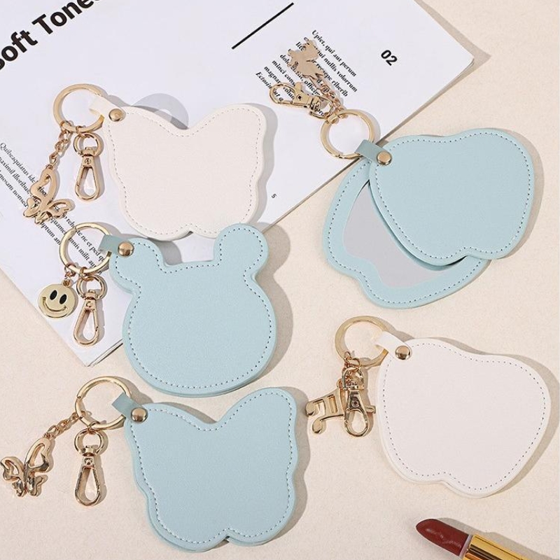 Gương da móc khóa - In dập logo theo yêu cầu 2 Gương da móc khóa - In dập logo theo yêu cầu Quà tặng công nghệ doanh nghiệp