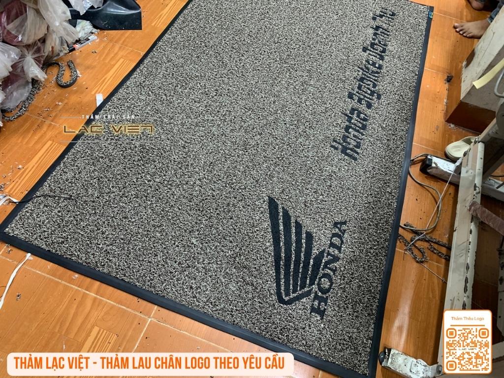 thêu logo thảm logo honda doanh thu