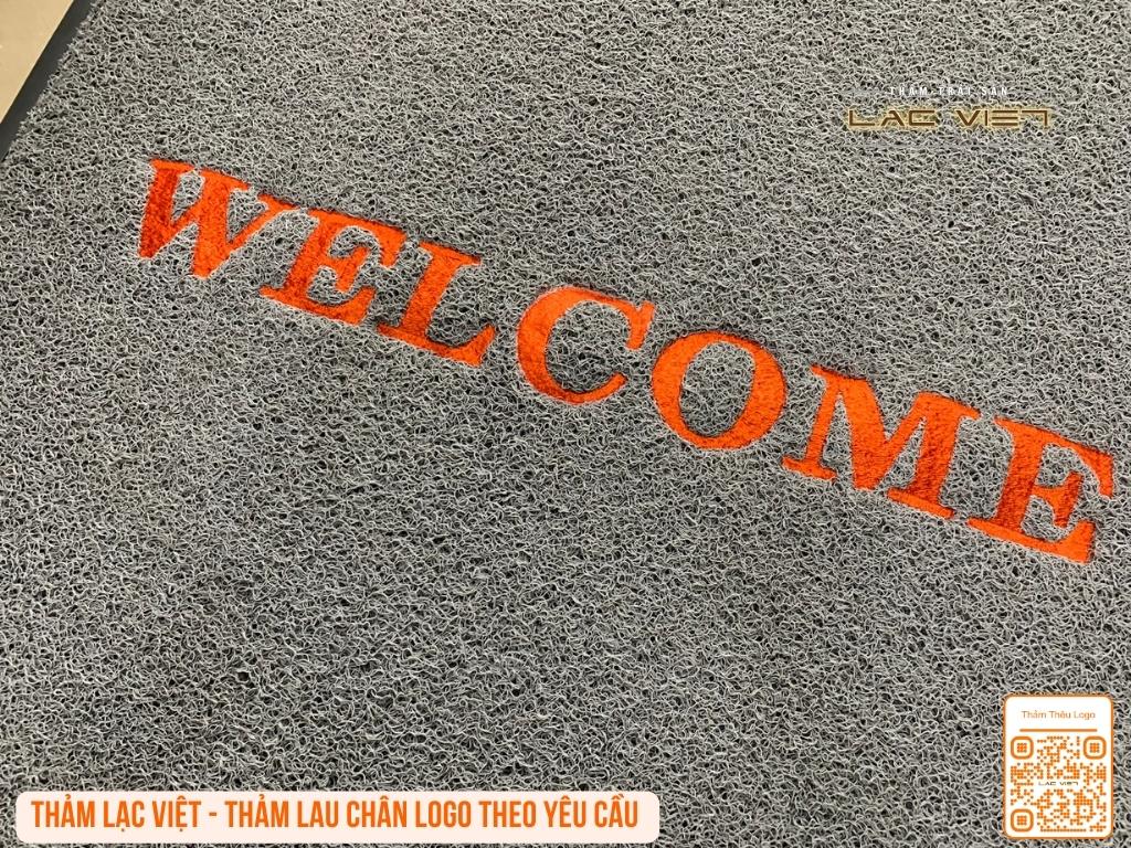 Thêu chữ welcome trên thảm nhựa