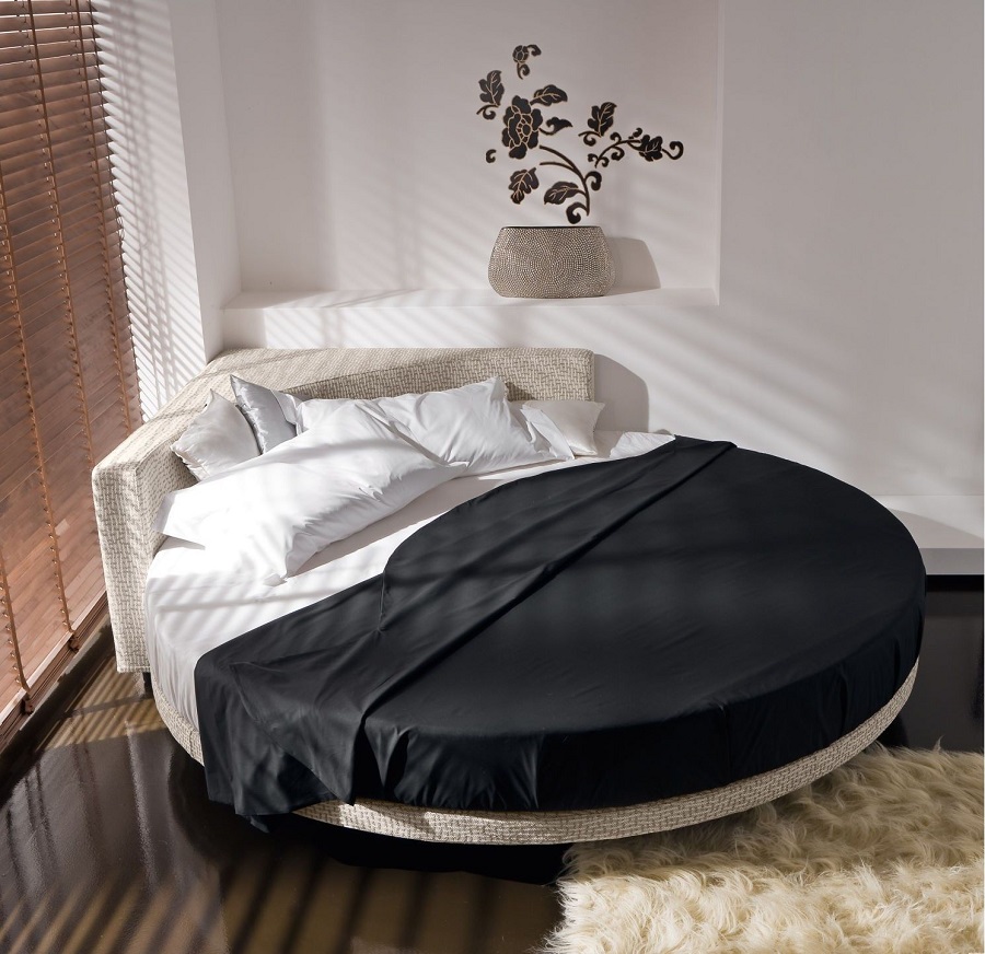 Mẫu giường ngủ tròn từ chất liệu sofa nỉ, thích hợp với không gian phòng ngủ có diện tích vừa phải