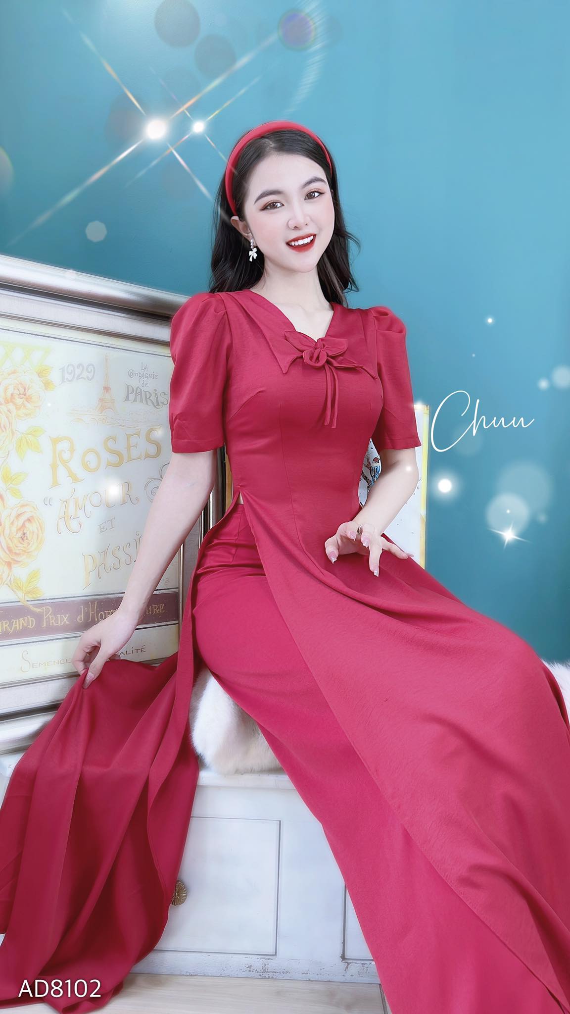 Áo dài đính nơ hoa quạt gió CHUU