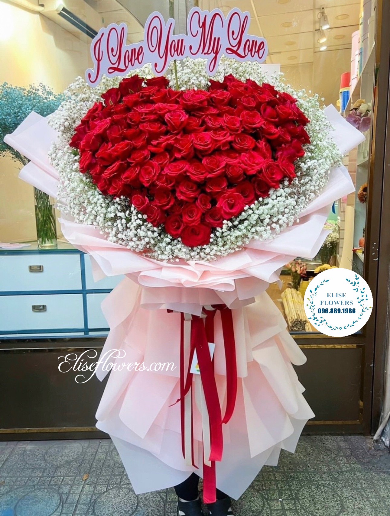 Bó hoa hồng đỏ trái tim 100 bông tặng vợ, bạn gái ngày 8/3. Bó hoa hồng đỏ đẹp ở Hà Nội. 