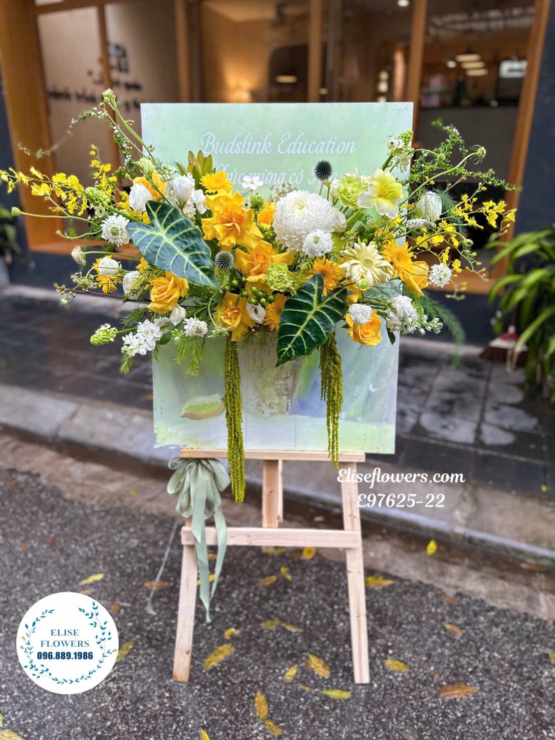 Kệ hoa khung tranh đẹp. Kệ tranh hoa tone xanh lá. Kệ khung tranh chúc mừng sự kiện. Eliseflowers