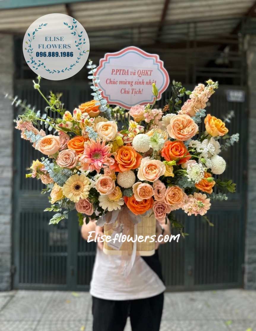 Lẵng hoa chúc mừng tone cam tây cao cấp. Lẵng hoa chúc mừng tân gia sang trọng tại quận Đống Đa