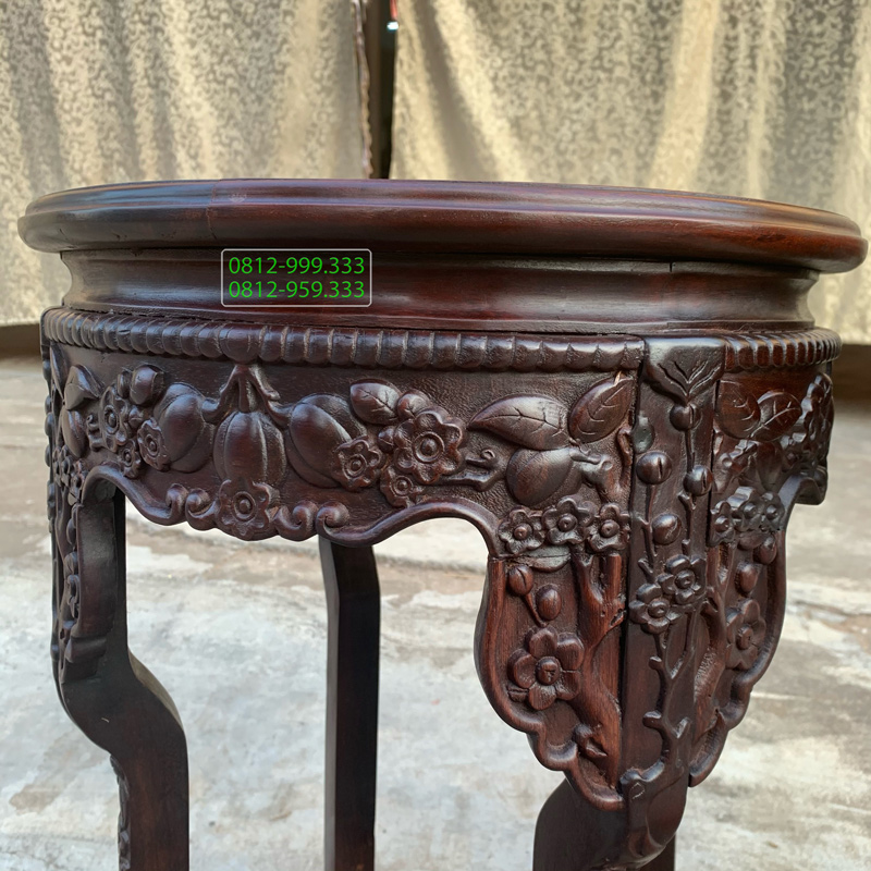 Đôn gỗ tròn chạm đào