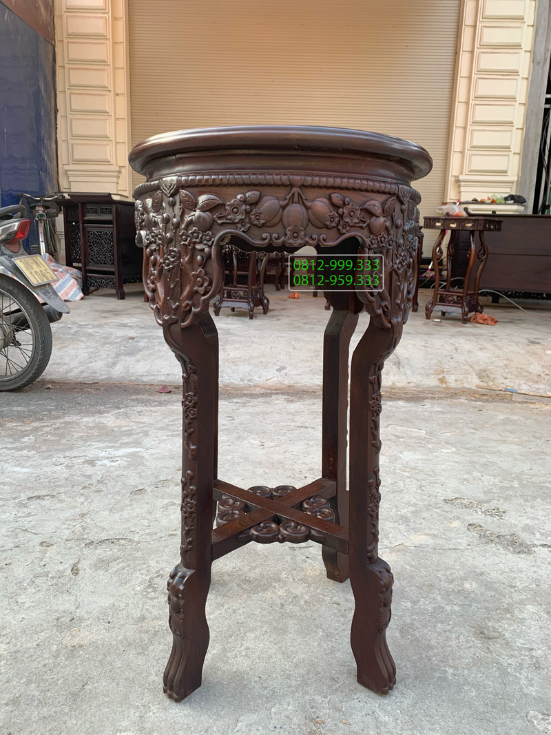 Đôn gỗ tròn chạm đào