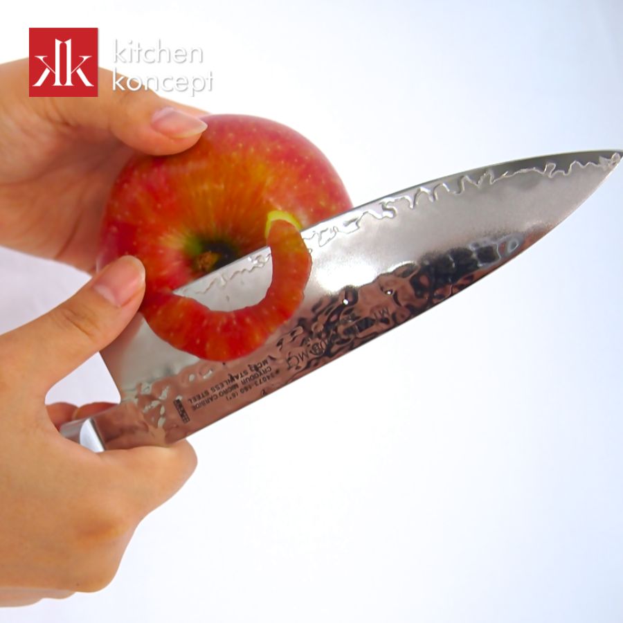 Kiểu cầm dao để gọt vỏ