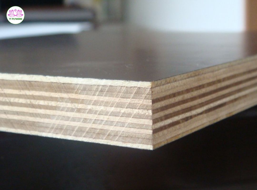 Reusable film faced plywood with phenolic overlay and sealed red edges for formwork.