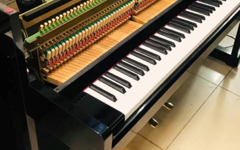 Cấu tạo bên trong của Yamaha DUP 10 rất giống đàn piano cơ