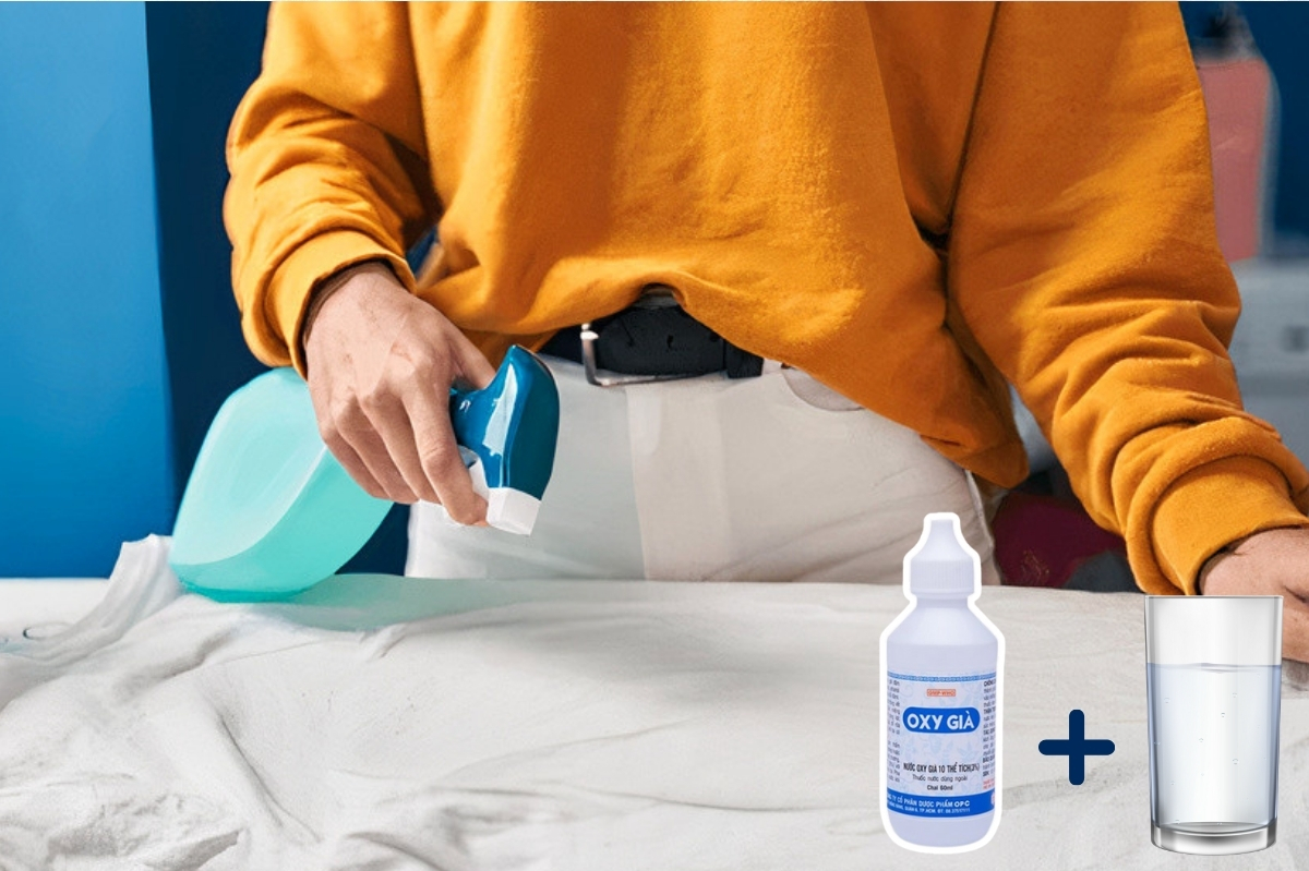 Tẩy trắng quần áo bằng xịt trực tiếp oxy già lên vết bẩn